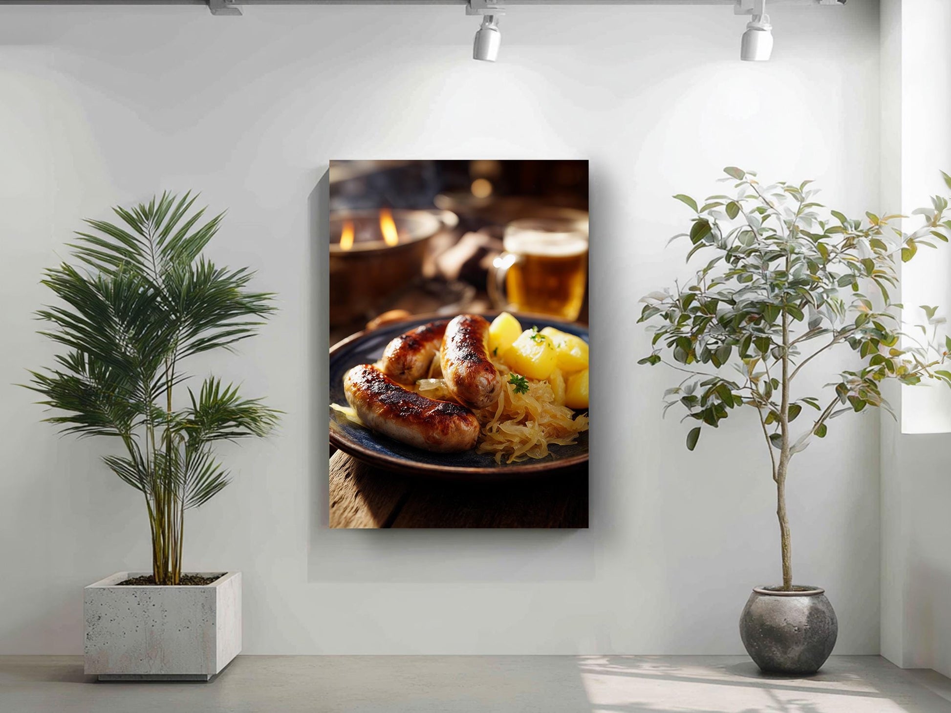 a framed photograph of a plate of sausages and sauerkraut, with a glass of beer nearby, set against a white wall with a potted plant on the left and a plant on the right.