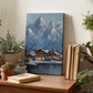a wooden table with a painting of a snowy mountain village, surrounded by potted plants and books.
