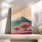 a painting of a mountain with a snow-capped peak and two pink trees in the foreground, set against a pale blue sky.