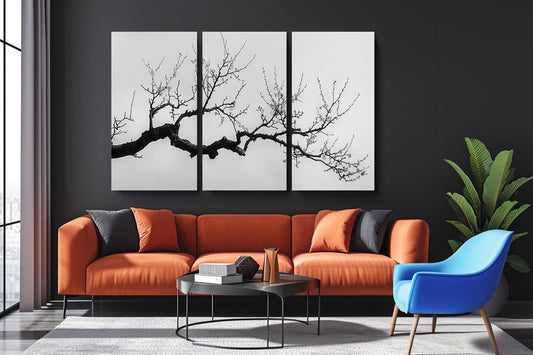 a living room with a couch and two chairs