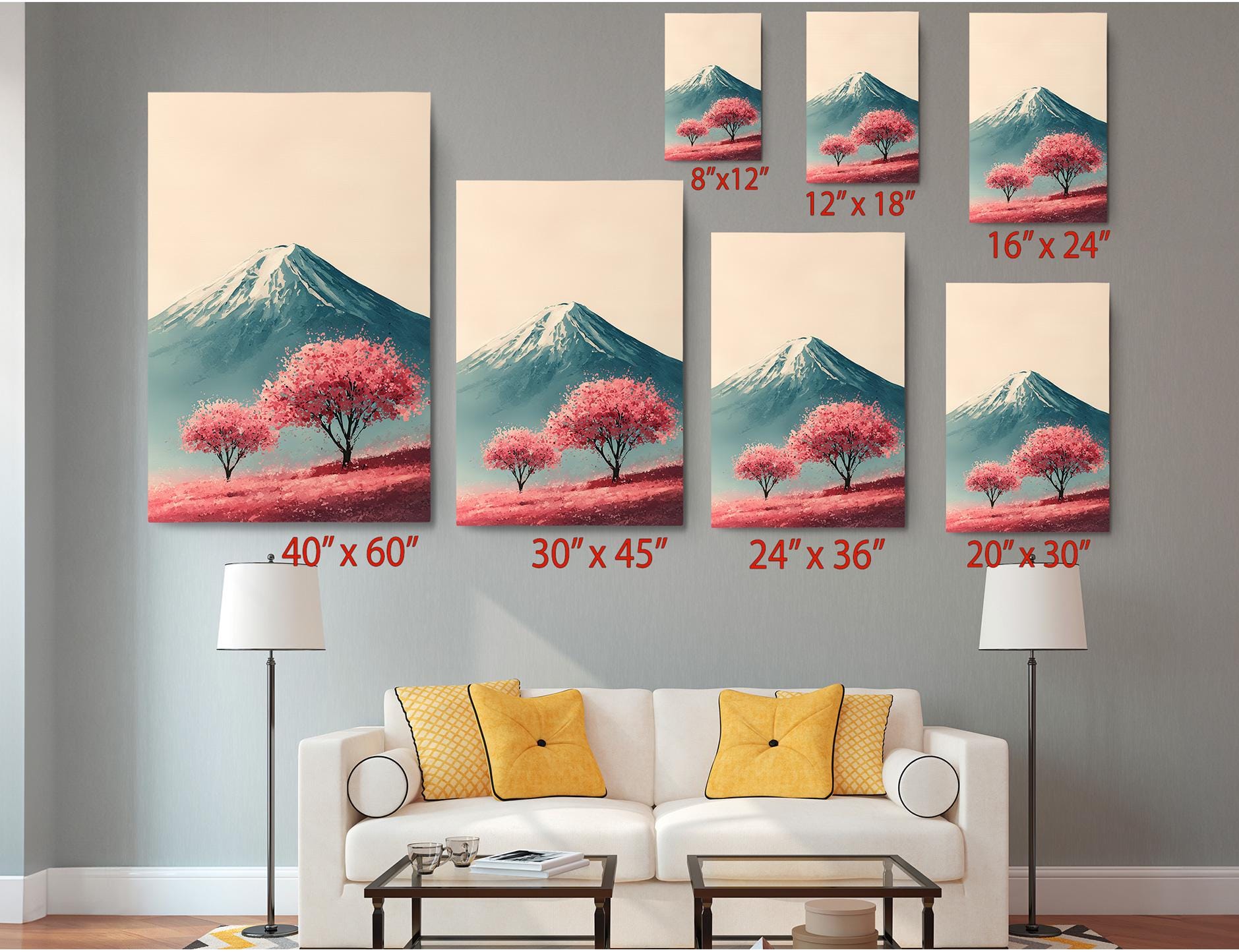 a living room with a white sofa and a coffee table. Above the sofa, there are six framed pictures of mountains with pink trees, each with a different size and resolution. The pictures are arranged in a grid-like pattern on the wall, providing a visual representation of the different sizes and aspects of the artwork.