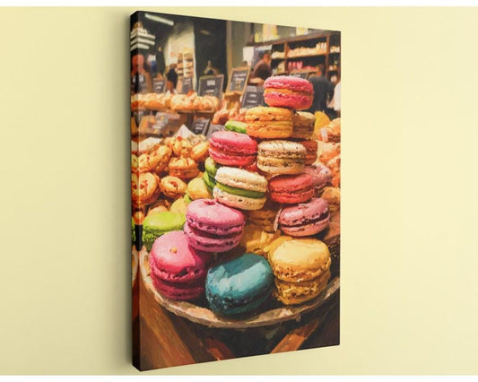 A display of colorful macarons and other pastries in a bakery, with a variety of shapes and sizes.
