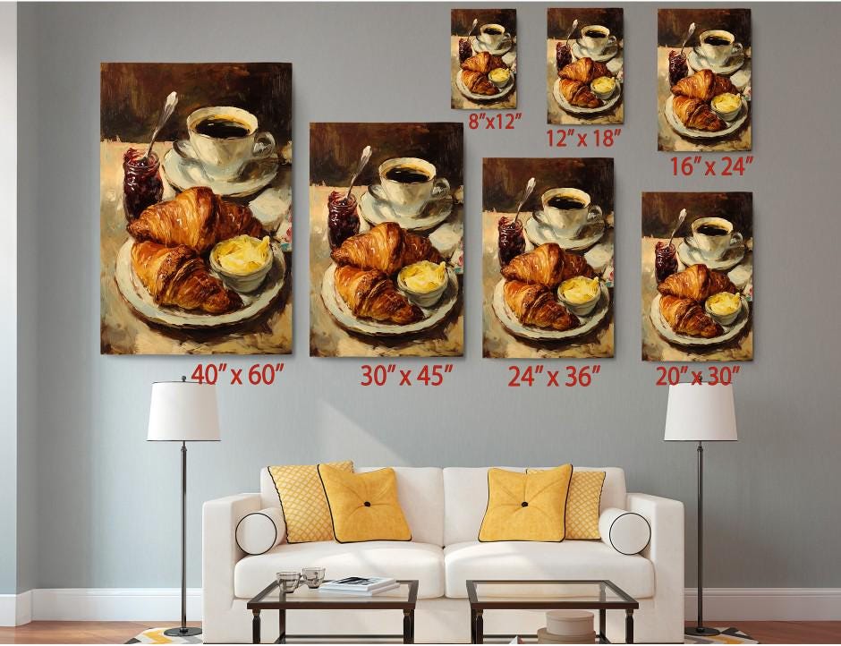 The image is a living room with a white couch and a coffee table. Above the couch, there are six framed paintings of croissants and coffee cups, each with a different size and resolution. The paintings are arranged in a grid-like pattern on the wall, creating a visually appealing display.