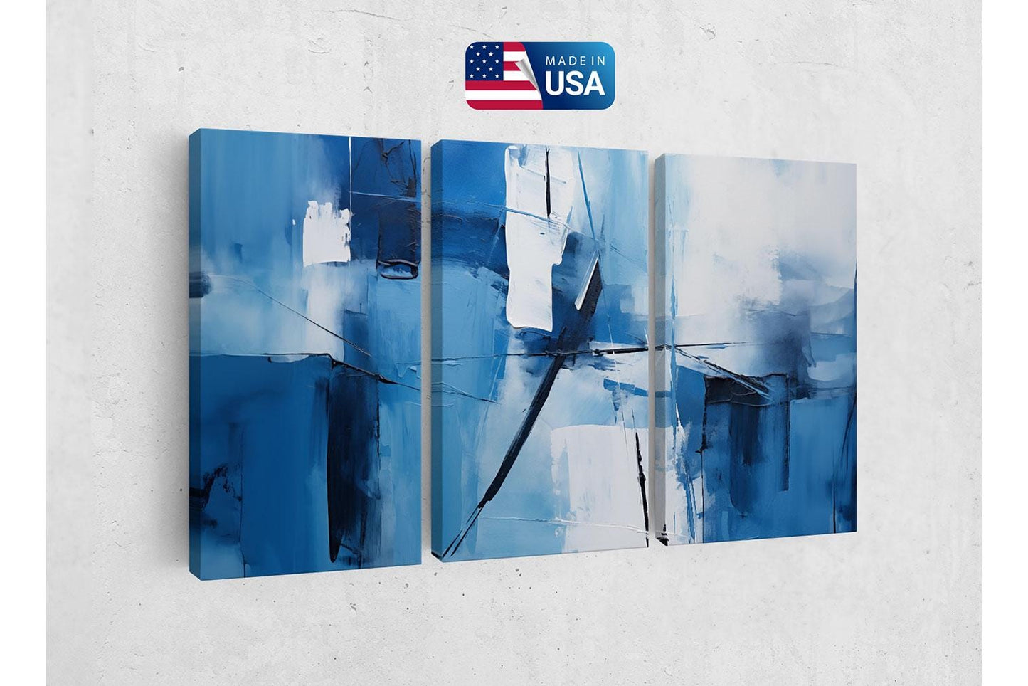 three pieces of art hanging on a wall