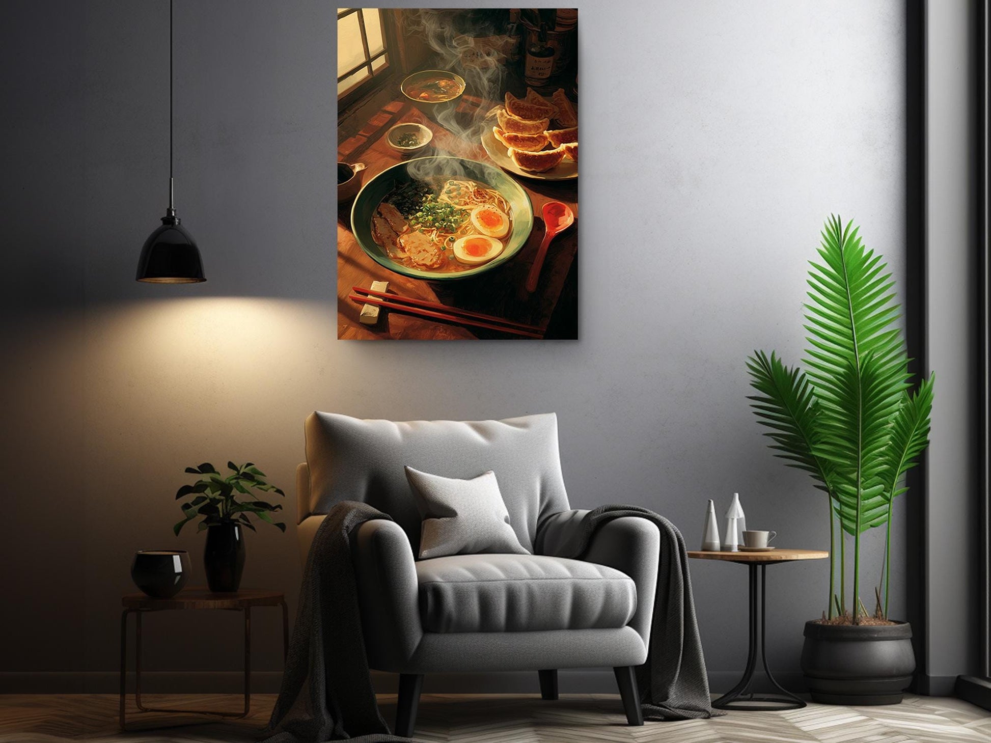 a cozy living room with a comfortable gray armchair, a wooden side table, and a potted plant. Above the armchair, there is a framed photograph of a bowl of ramen noodles with various toppings, including egg and meat, creating a warm and inviting atmosphere.