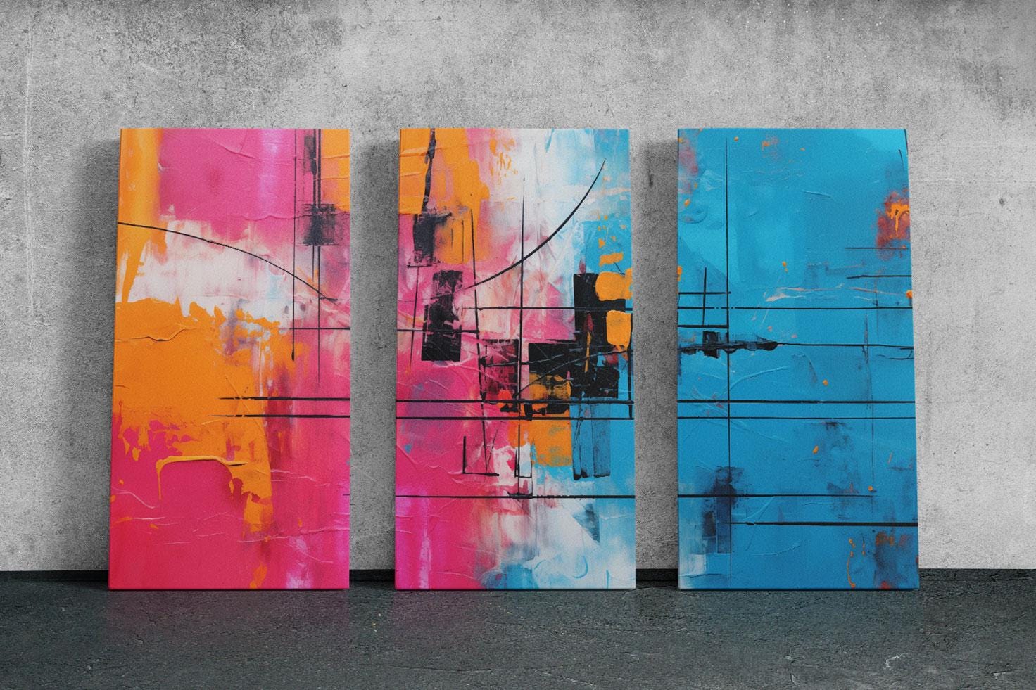 three paintings of different colors on a wall