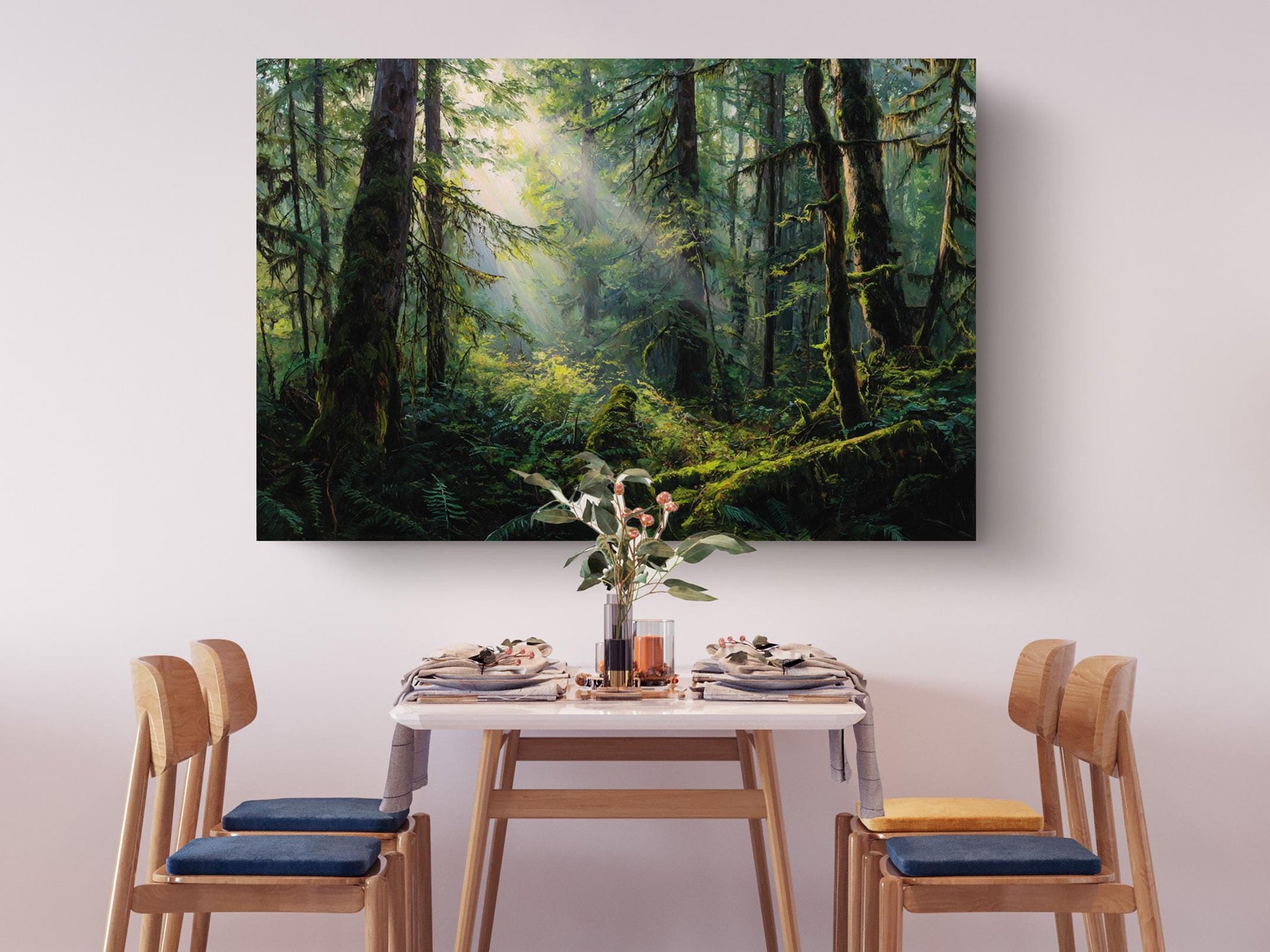 a serene dining scene with a table set for four, surrounded by four wooden chairs. Above the table, a large painting of a lush forest scene is displayed, creating a peaceful and natural ambiance.
