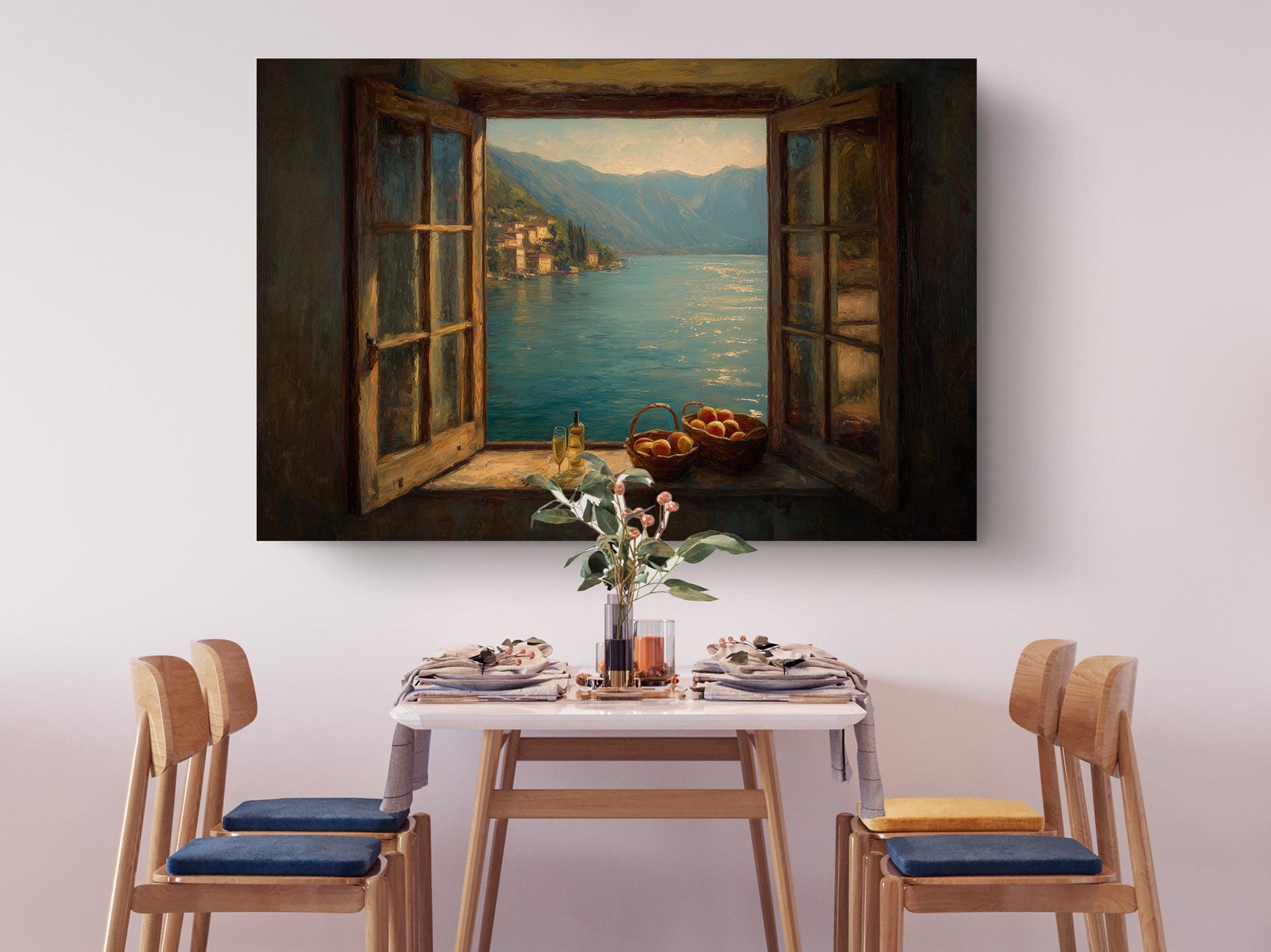 a dining table set with plates, silverware, and a vase of flowers, with a painting of a scenic view of a lake and mountains hanging above it.