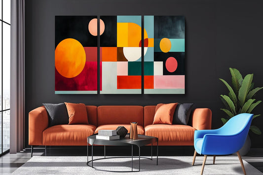 a living room with a couch a chair and a painting on the wall