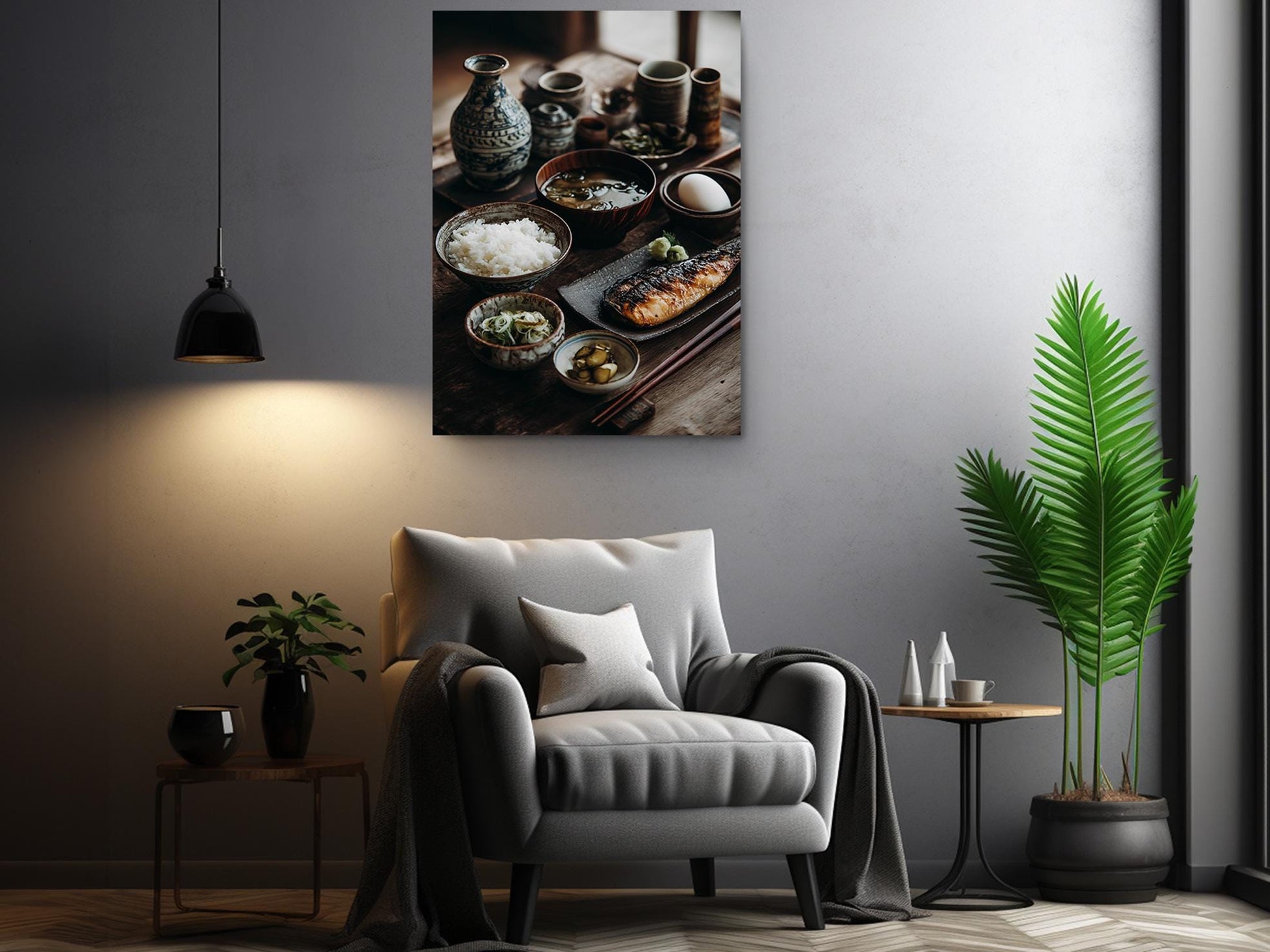 a cozy living room with a comfortable gray armchair, a wooden side table, and a potted plant. Above the armchair, there is a framed photograph of various bowls and dishes, creating a warm and inviting atmosphere.