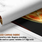The image is a rolled canvas fabric, which is a type of canvas material used for painting or printing. It is described as a tube-delivered canvas fabric, which means it is delivered in a tube and requires stretching before use. It can be used as a poster with a 2.5&quot; edge area.