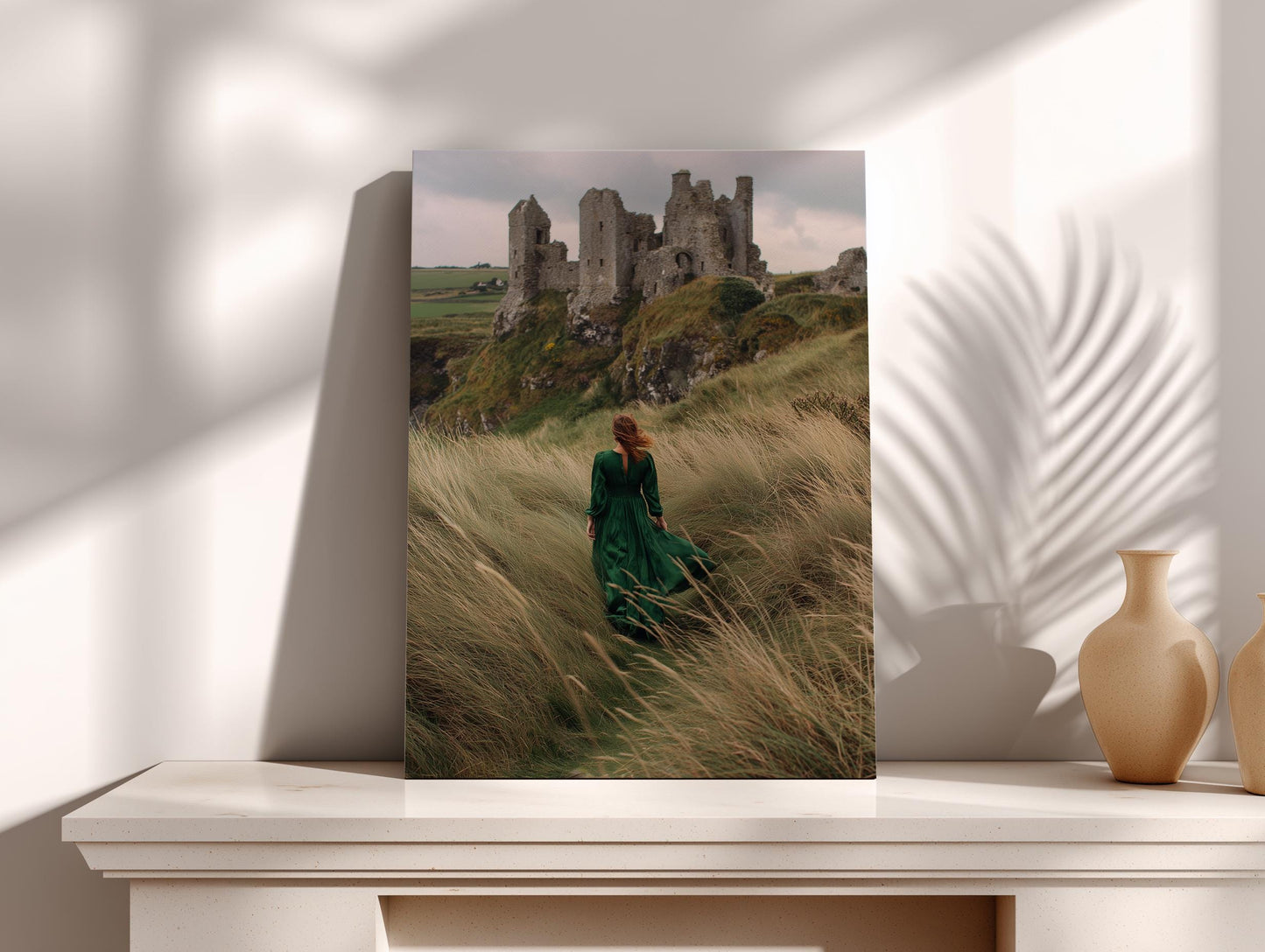 A woman in a green dress is walking through tall grass in front of a castle, with a cloudy sky in the background.