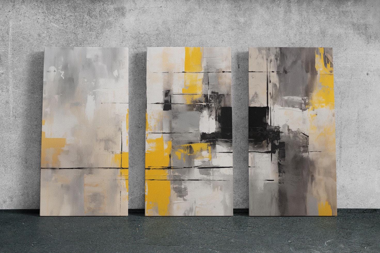 three abstract paintings on a wall in a room