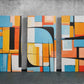 three paintings of different colors on a wall