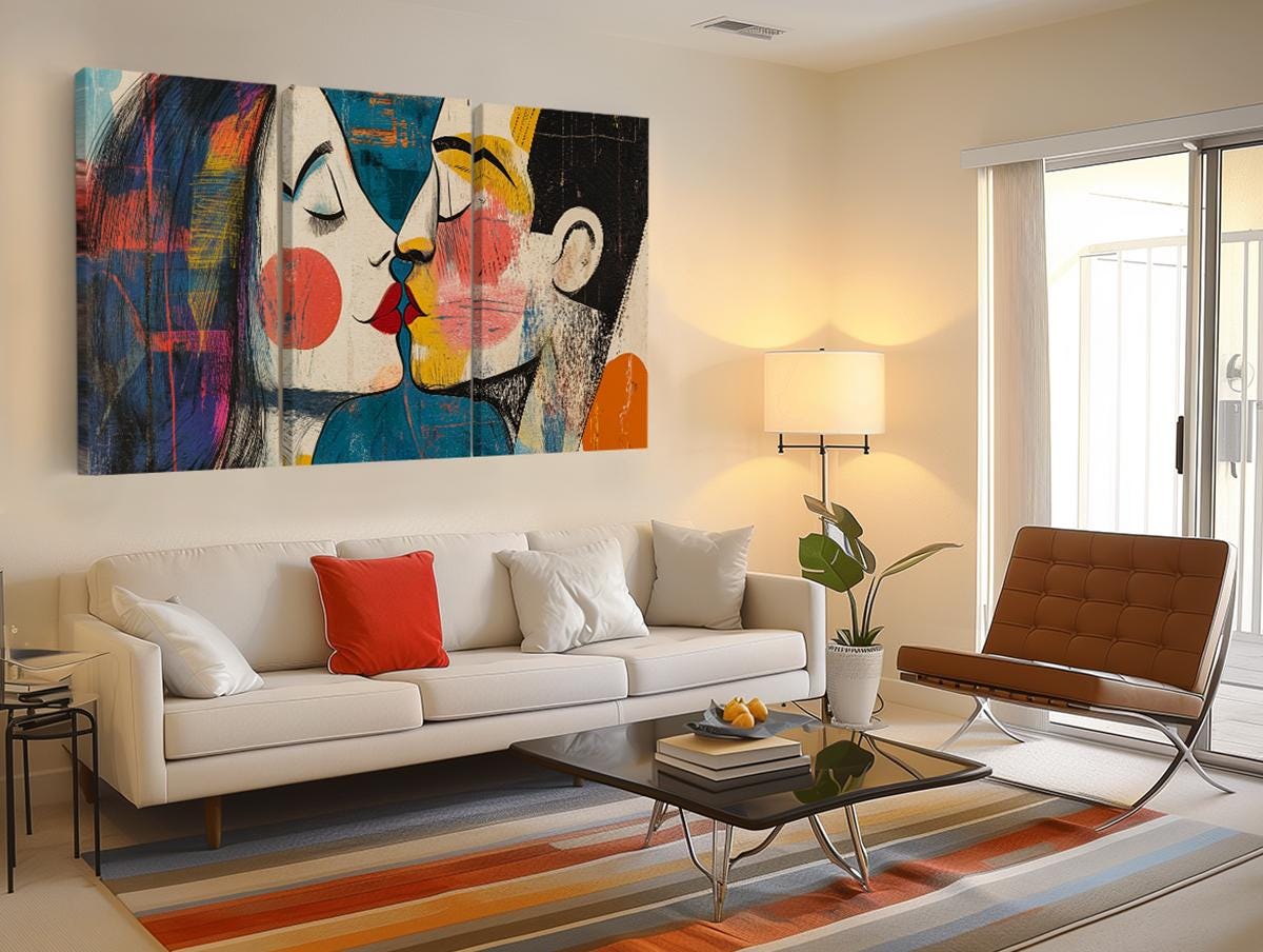 a living room filled with furniture and a painting on the wall