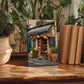 a wooden table with a framed photograph of a quaint shop, surrounded by potted plants and books, creating a cozy and inviting atmosphere.