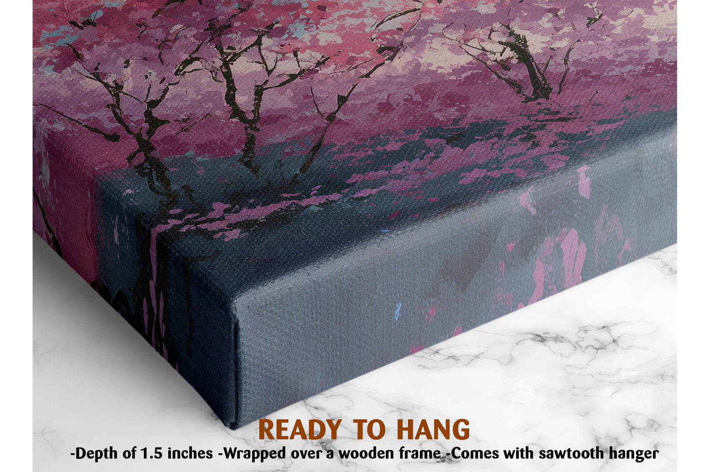 The image is a close-up of a framed painting depicting a landscape with trees and pink flowers. The painting is wrapped over a wooden frame and hangs on a wall.