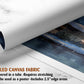 The image is a rolled canvas fabric, which is a type of canvas material used for painting or printing. It is described as a tube-delivered canvas fabric, which means it is delivered in a tube and requires stretching before use. It can be used as a poster with a 2.5&quot; edge area.