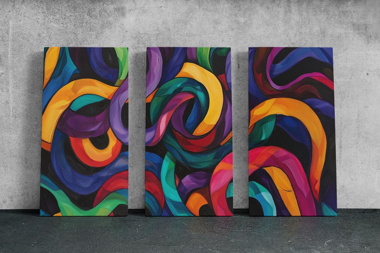 three paintings of different colors on a wall