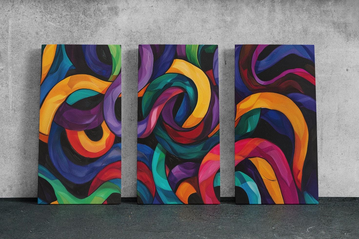 three paintings of different colors on a wall