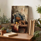 a wooden table with a painting of a still life scene, including a fan, fruit, and other decorative items. The table also has several books and potted plants, creating a cozy and artistic atmosphere.