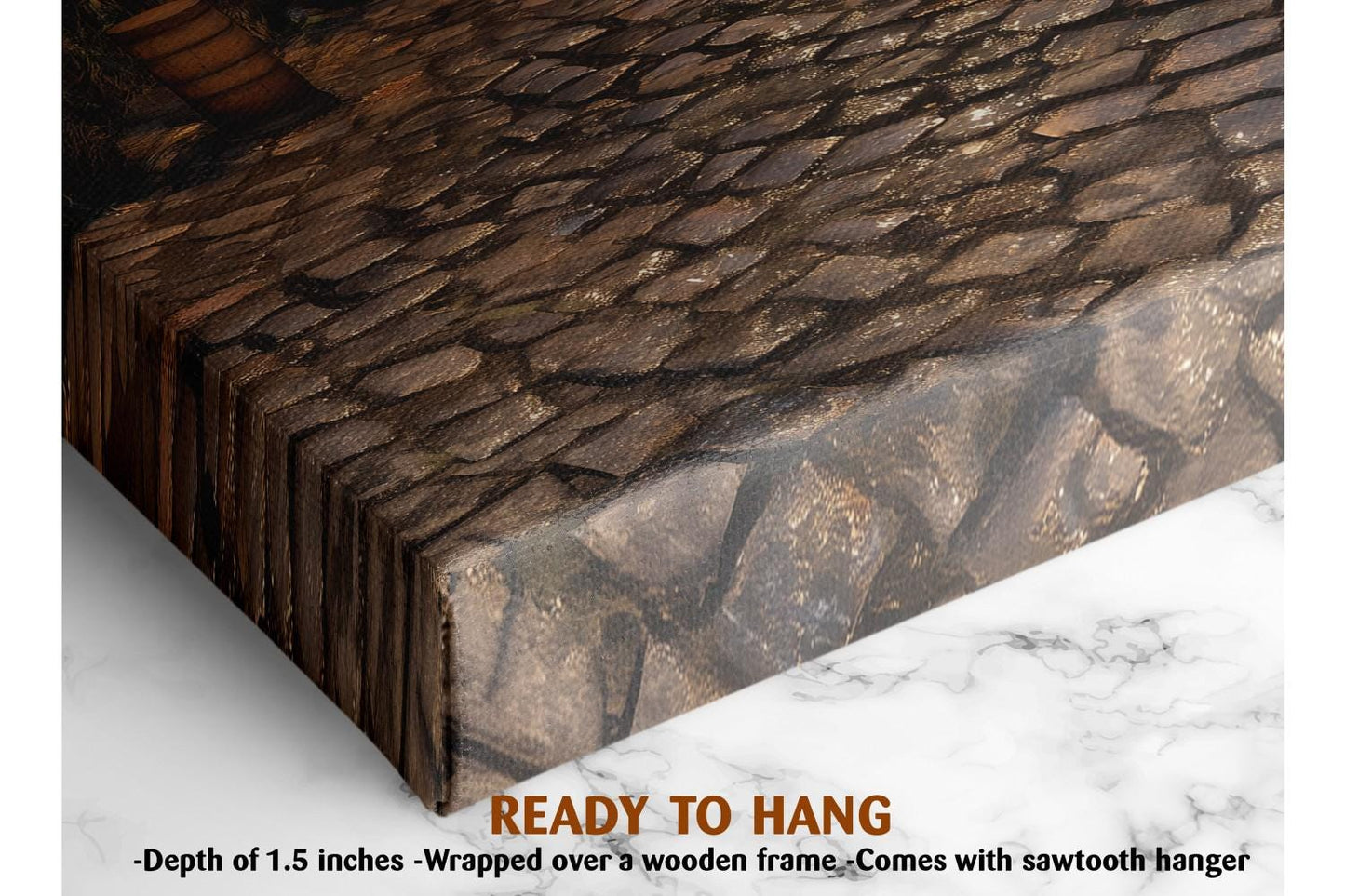 a close-up view of a wooden frame with a textured surface, likely a piece of wall art or a painting. The frame appears to be wrapped over a wooden frame, and the text indicates that it is ready to hang.