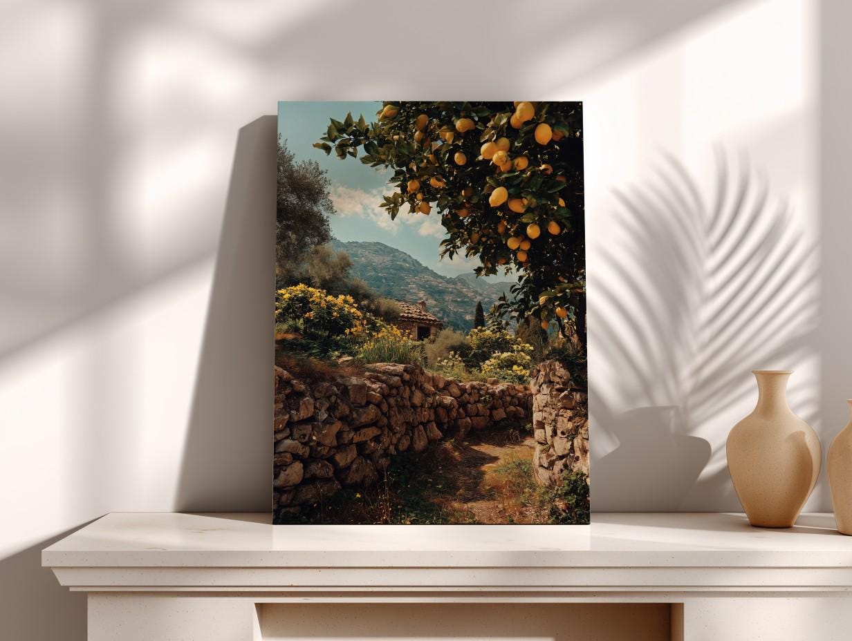 a stone wall with a path leading through it, surrounded by a grove of orange trees with ripe fruit hanging from the branches.