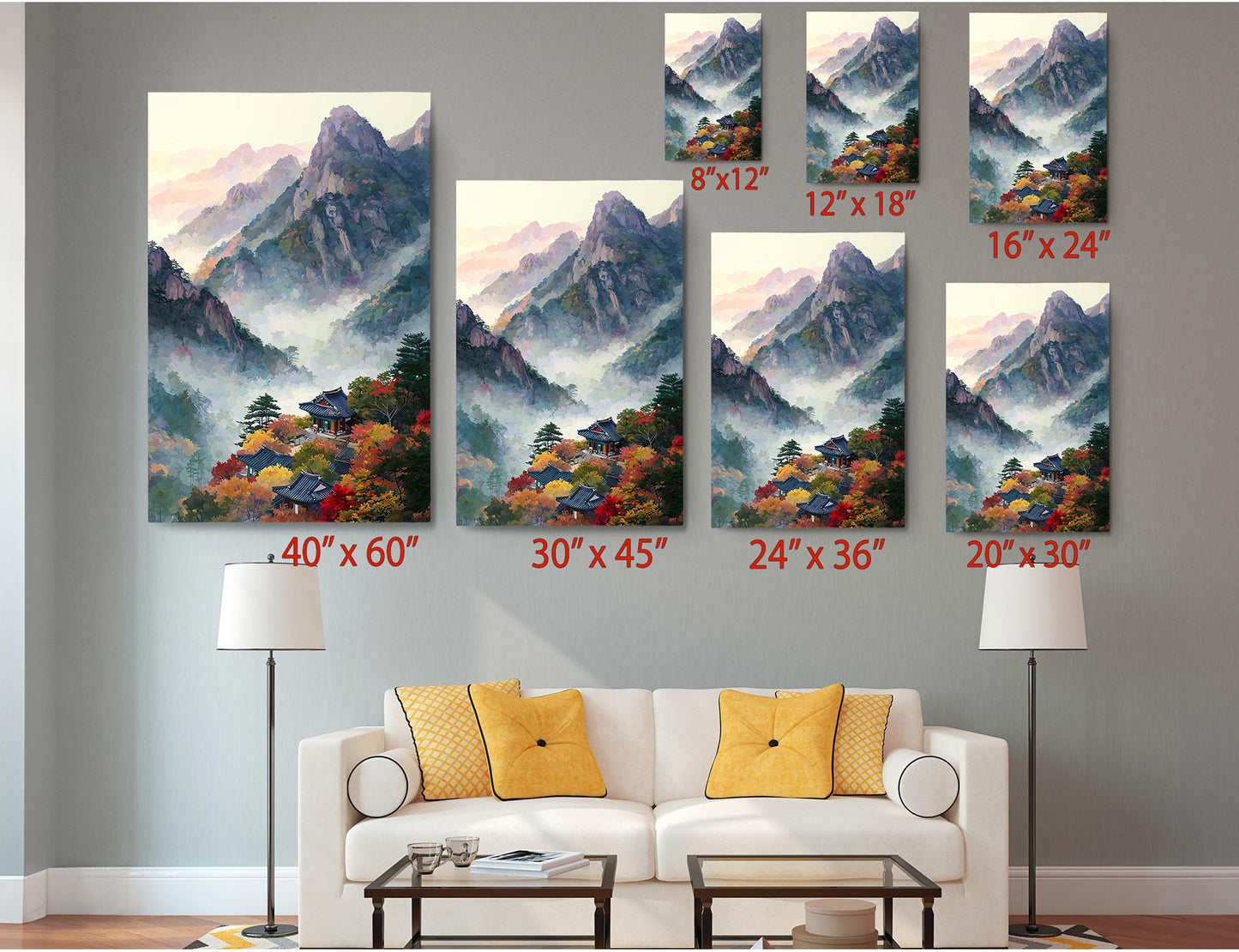 a living room with a white sofa and a coffee table, along with several framed landscape paintings displayed on the wall. The paintings vary in size, with some being larger than others, and are arranged in a grid-like pattern.