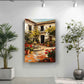 a large painting of a courtyard with a fountain, surrounded by potted plants and flowers, hanging on a white wall.