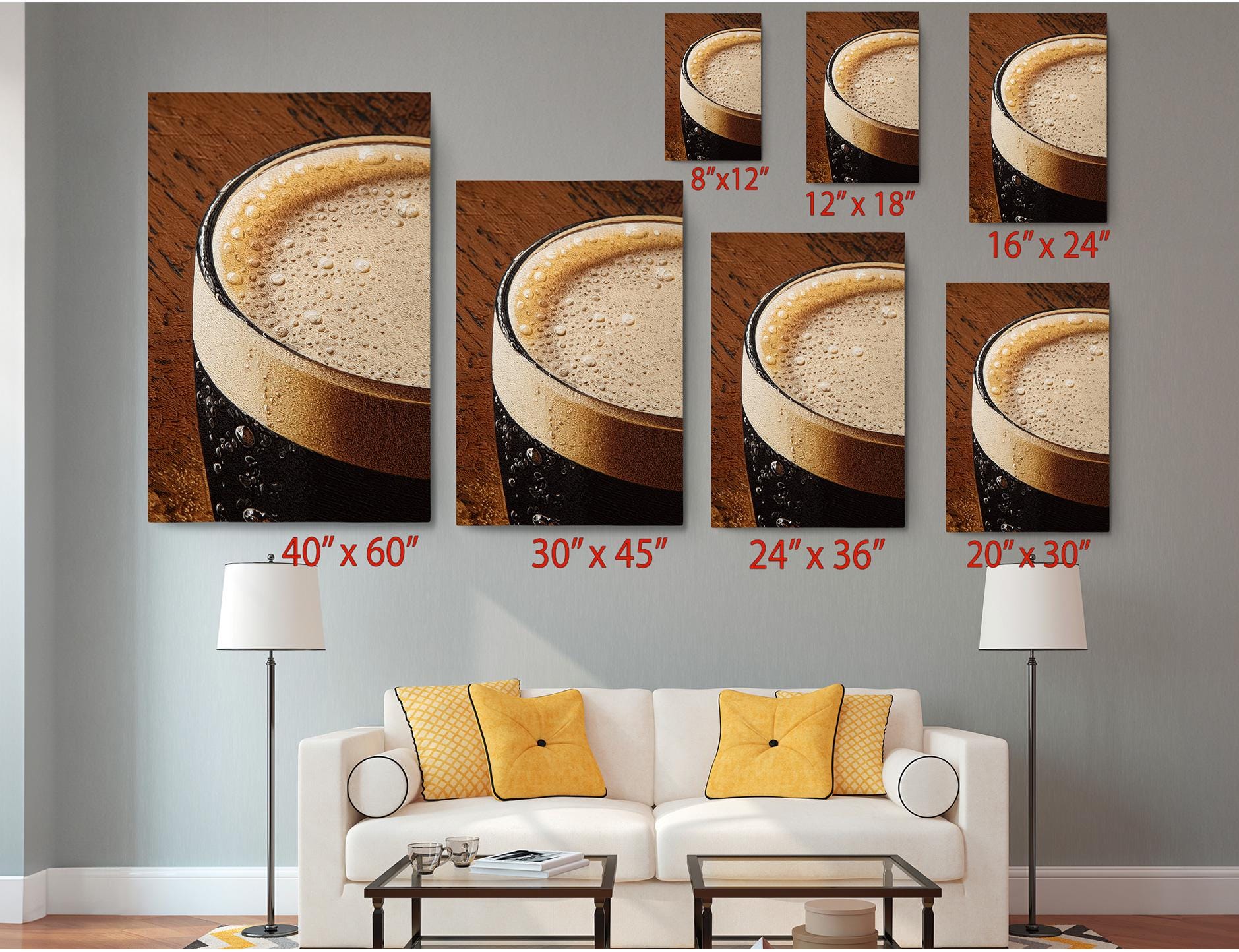 a living room with a white couch and a coffee table. Above the couch, there are six framed images of beer glasses, each with a different size and perspective, ranging from 8&quot; x 12&quot; to 24&quot; x 36&quot;. The images are arranged in a grid-like pattern on the wall, with each one depicting a different view of a glass of beer.