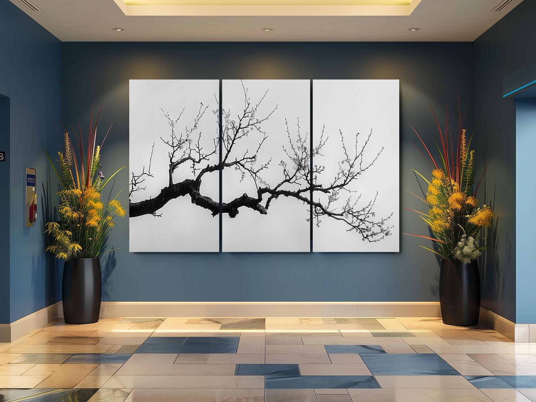 a room with two large paintings on the wall