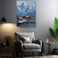a cozy living room with a comfortable gray armchair, a wooden side table, and a potted plant. Above the armchair, a painting of a snowy mountain landscape with a small village in the background is displayed on the wall.