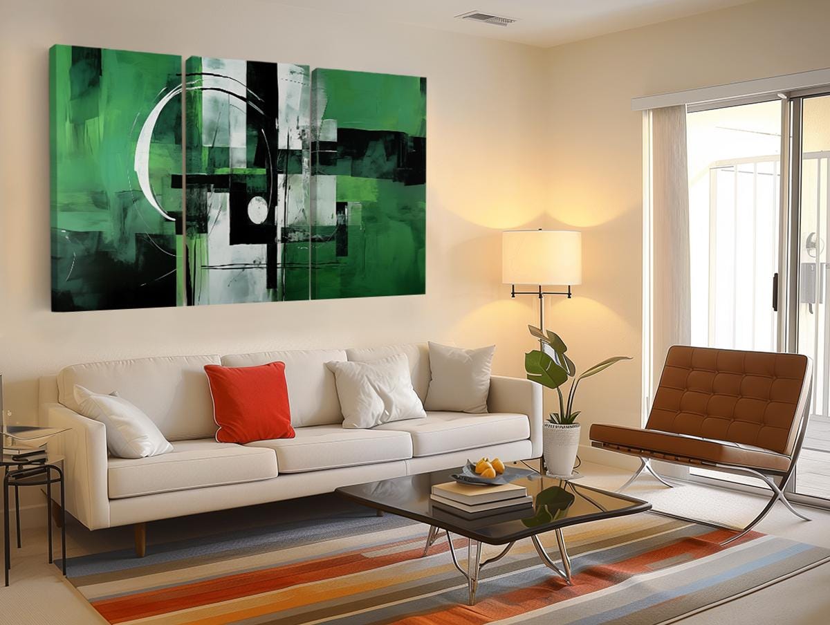 a living room filled with furniture and a painting on the wall