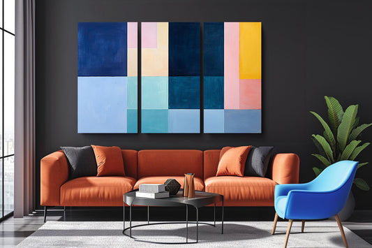 a living room with a couch and two chairs