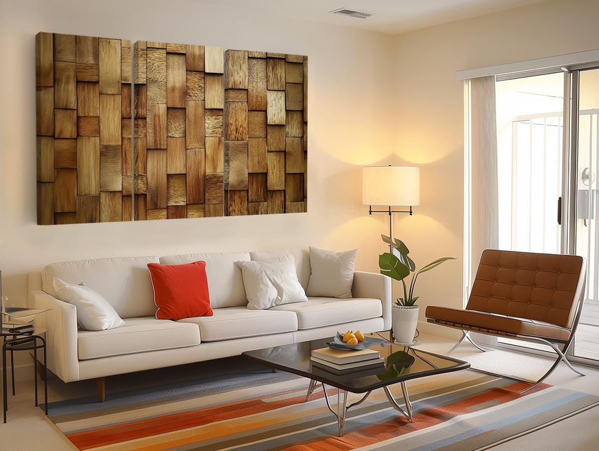 a living room with a couch, chair, table and a painting on the wall