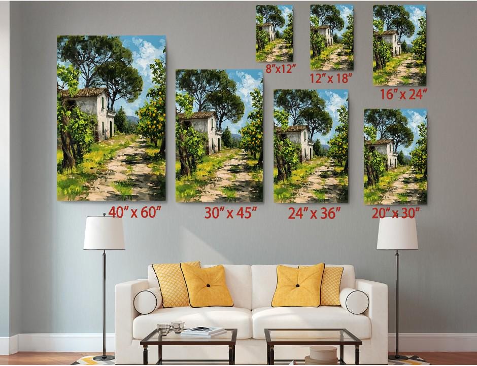 The image is a living room with a white sofa and a coffee table. Above the sofa, there are six identical paintings of a rural landscape, each with a different size and resolution. The paintings are arranged in a grid-like pattern on the wall, with each one depicting a different scene of a tree-lined path. The paintings vary in size, ranging from 40 x 60 to 24 x 36, and the resolution is also different, with some being higher quality than others.