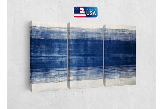 a blue and white painting on a wall