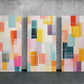 three abstract paintings on a wall with a concrete background