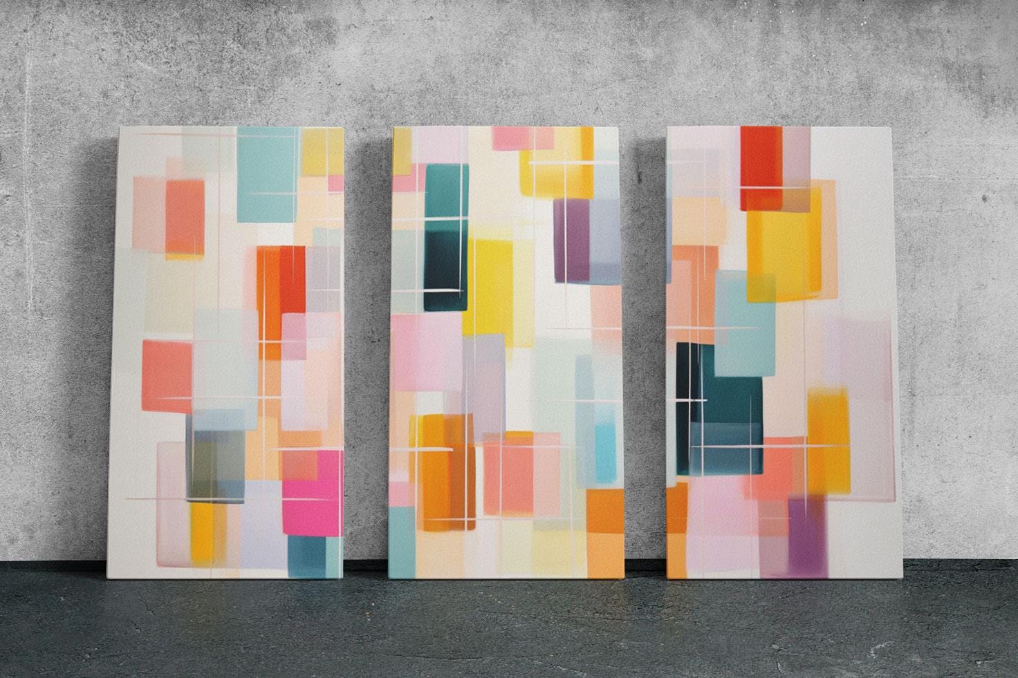 three abstract paintings on a wall with a concrete background