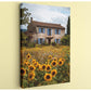 A picturesque scene of a two-story stone house surrounded by a vibrant field of sunflowers, set against a backdrop of a blue sky with clouds.