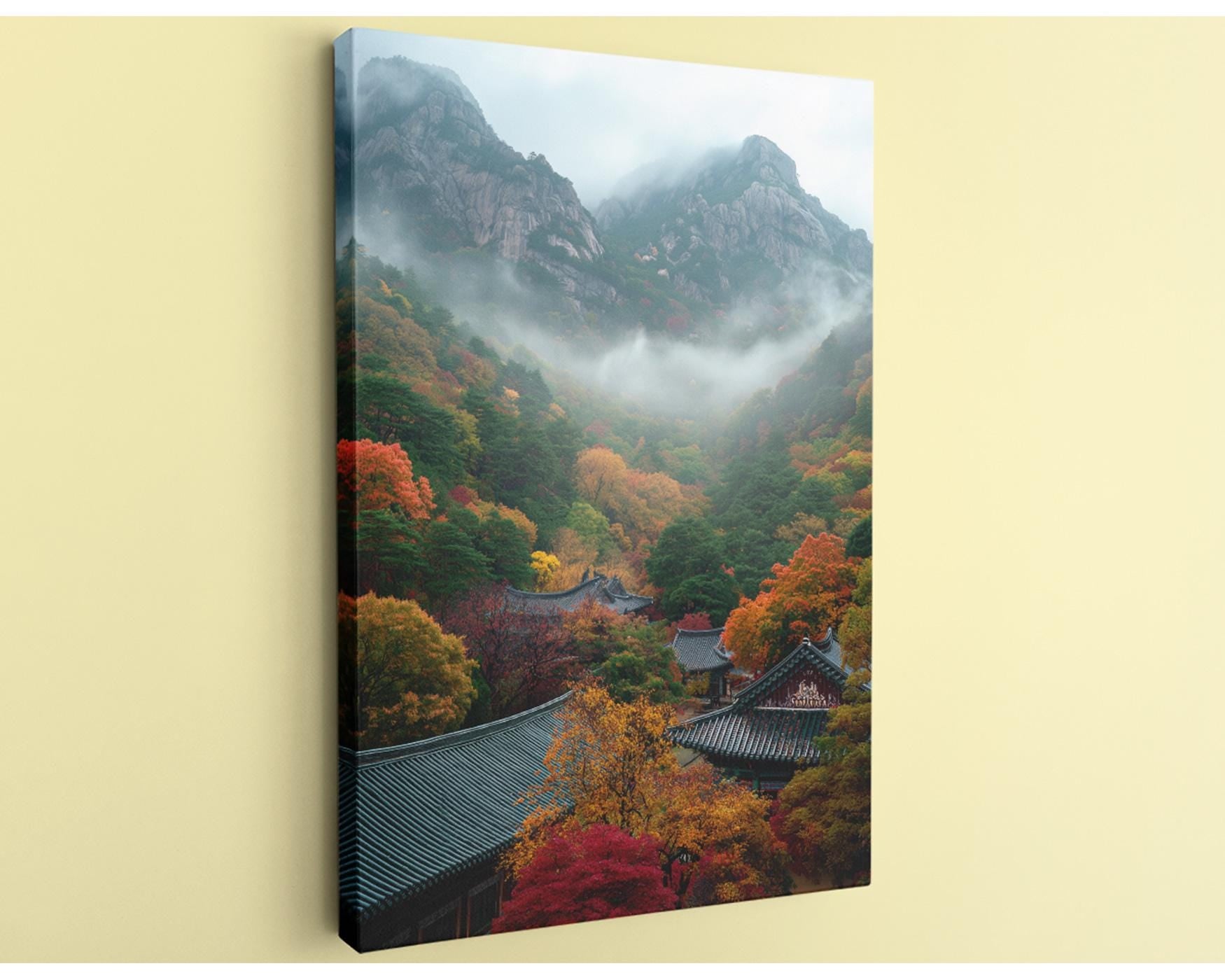 a serene mountainous landscape with a temple nestled among the trees, surrounded by a misty atmosphere.