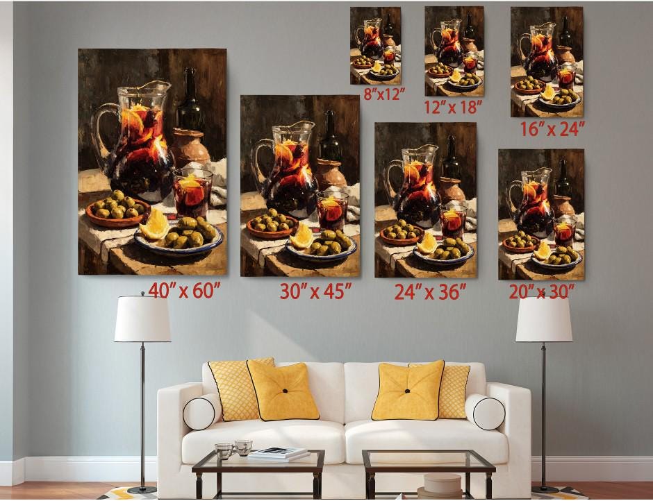 The image is a collage of six framed paintings depicting a table with various food items, including olives, a pitcher of wine, and a plate of fruit. The paintings are arranged in a grid format, with each painting having a different size and dimensions. The paintings are displayed on a wall above a white couch, creating a cozy and inviting atmosphere in the living room.