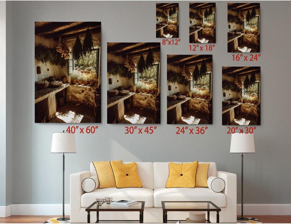 The image is a living room with a white sofa and a coffee table, and there are multiple framed photographs of the same scene displayed on the wall.