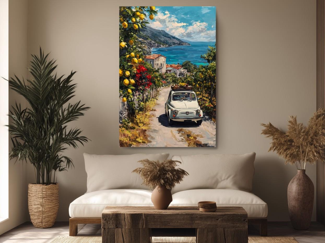 a cozy living room with a large painting of a white car driving down a coastal road, surrounded by lush greenery and a picturesque view of the sea.