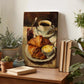 a painting of a croissant and butter on a plate, surrounded by potted plants and books on a wooden surface.