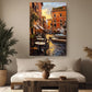 a cozy living room with a large painting of a picturesque street scene hanging on the wall. The painting depicts a charming European town with colorful buildings, outdoor seating areas, and a tranquil atmosphere. The room is decorated with potted plants, a wooden coffee table, and a comfortable sofa, creating a warm and inviting ambiance.