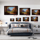 The image is a bedroom with a large bed, a nightstand, and a desk. Above the bed, there are five framed landscape paintings of varying sizes, each depicting a different mountain scene. The paintings are arranged in a grid-like pattern on the wall, with each painting having a different size and frame.