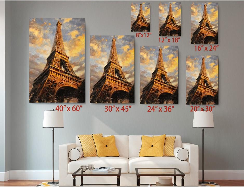 a living room with a white sofa and a coffee table. Above the sofa, there are six framed images of the Eiffel Tower, each with a different size and resolution, ranging from 6 x 12 to 20 x 30. The images are arranged in a grid-like pattern on the wall, creating a visually appealing display.
