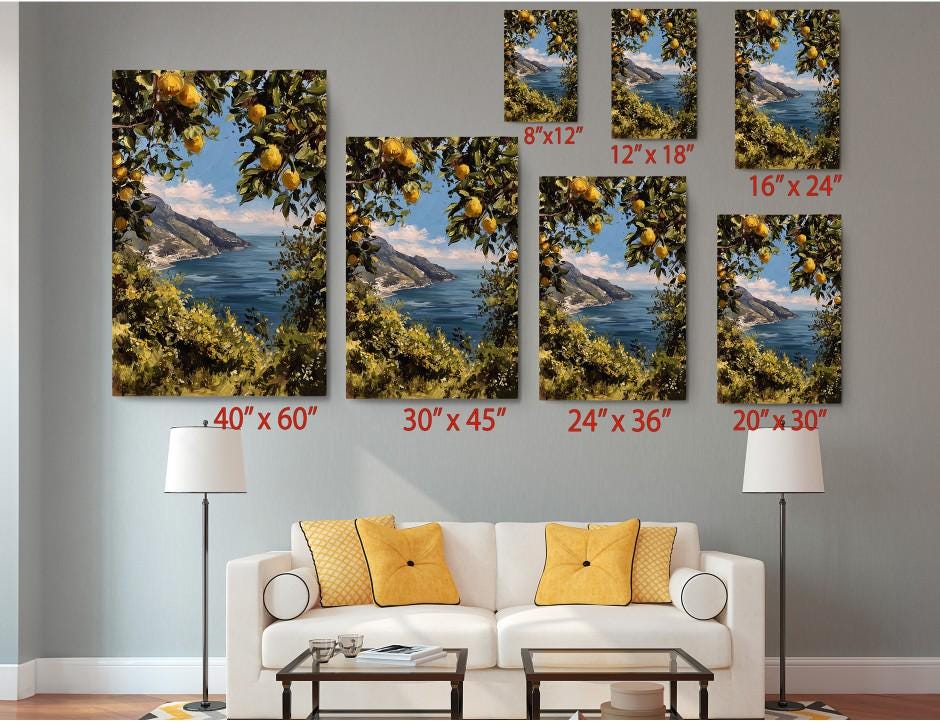 The image is a living room with a white sofa and a coffee table. Above the sofa, there are six framed pictures of landscapes, including a scenic view of a coastline and mountains. Each picture has a different size, ranging from 6 x 12 to 20 x 30 inches. The pictures are arranged in a grid-like pattern on the wall, creating a visually appealing display.