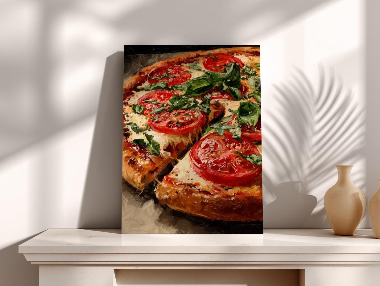 A framed painting of a pizza with tomato and basil toppings is displayed on a white shelf against a white wall.